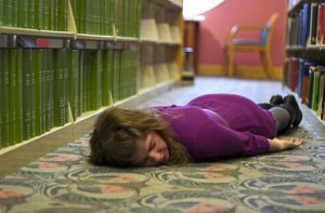 At least no one will fire you for passing out in a library.